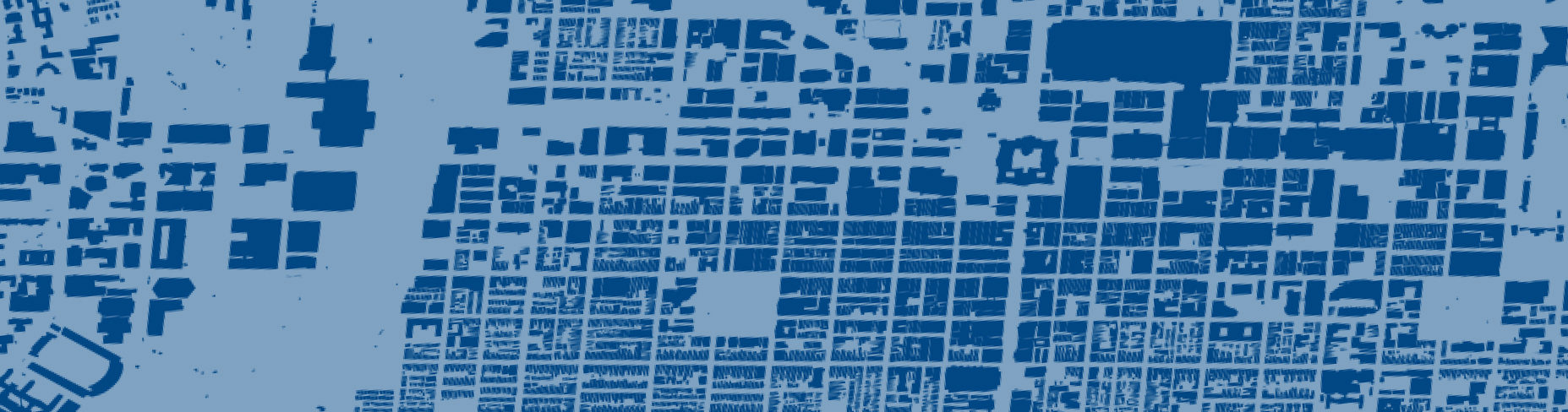 A blue toned abstract representation of an urban street map with grid-like patterns.